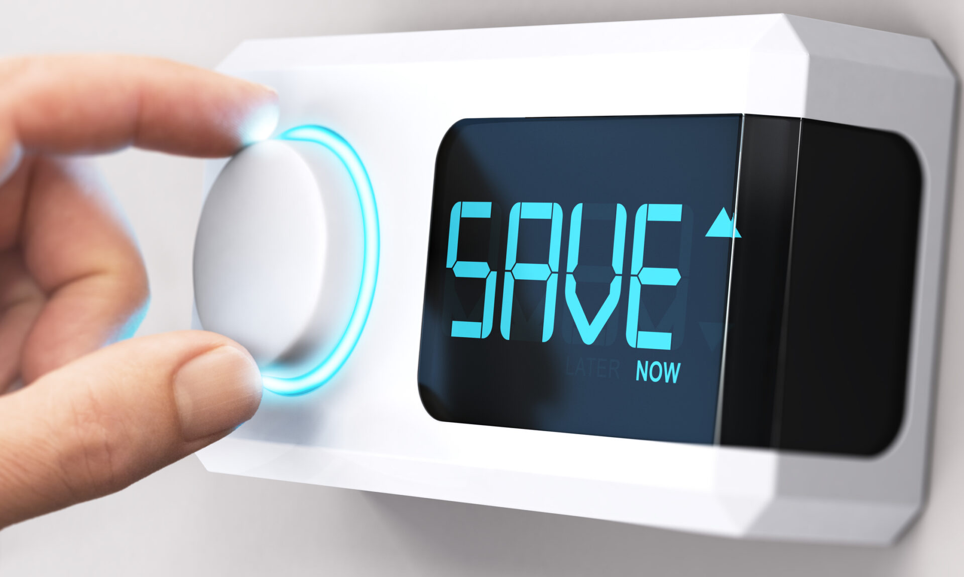 Homeowner's hand on the thermostat knob that says save now